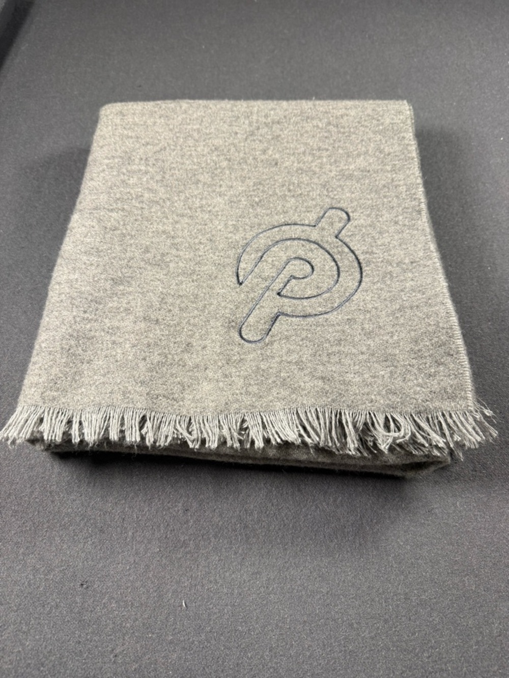 Peloton Wool Cashmere Blend Throw Blanket 50x60 Gray Fringe with logo
